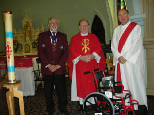 KOFC4949 2011-2012 Wheelchair Prject reaised funds for 47 wheelchairs, GK Guenter A. Rieger, Father Dale and Deacon Paul Murphy