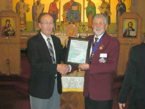 KOFC 4949: Brother Victor Szadak received his Lifemember from GK Guenter . Rieger