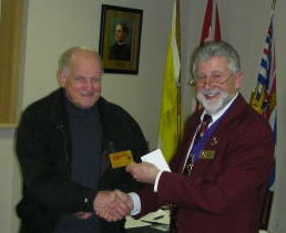 KOFC4949 Martin Belec received from Grand Knight Guenter A. Rieger his certificate Golden Life Membership card